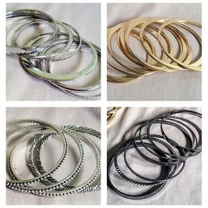 Set of 4 Chicos bangle bracelets.  Size chart http